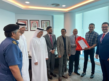 Khalfaan Al Kaebi, Head of Customs, Dubai Airport Free Zone Authority, handing over the first consignment 